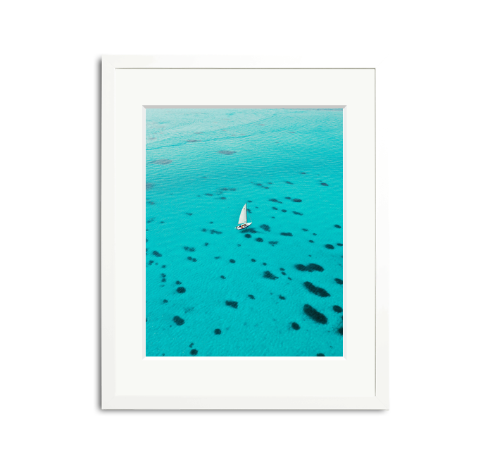 Dalmatian Pattern Framed Wall Art Print: White sailboat on turquoise water, white wooden frame, custom white mat.