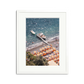 D'Arienzo II framed wall art print of a vibrant Italian beach with orange striped umbrellas and boats.