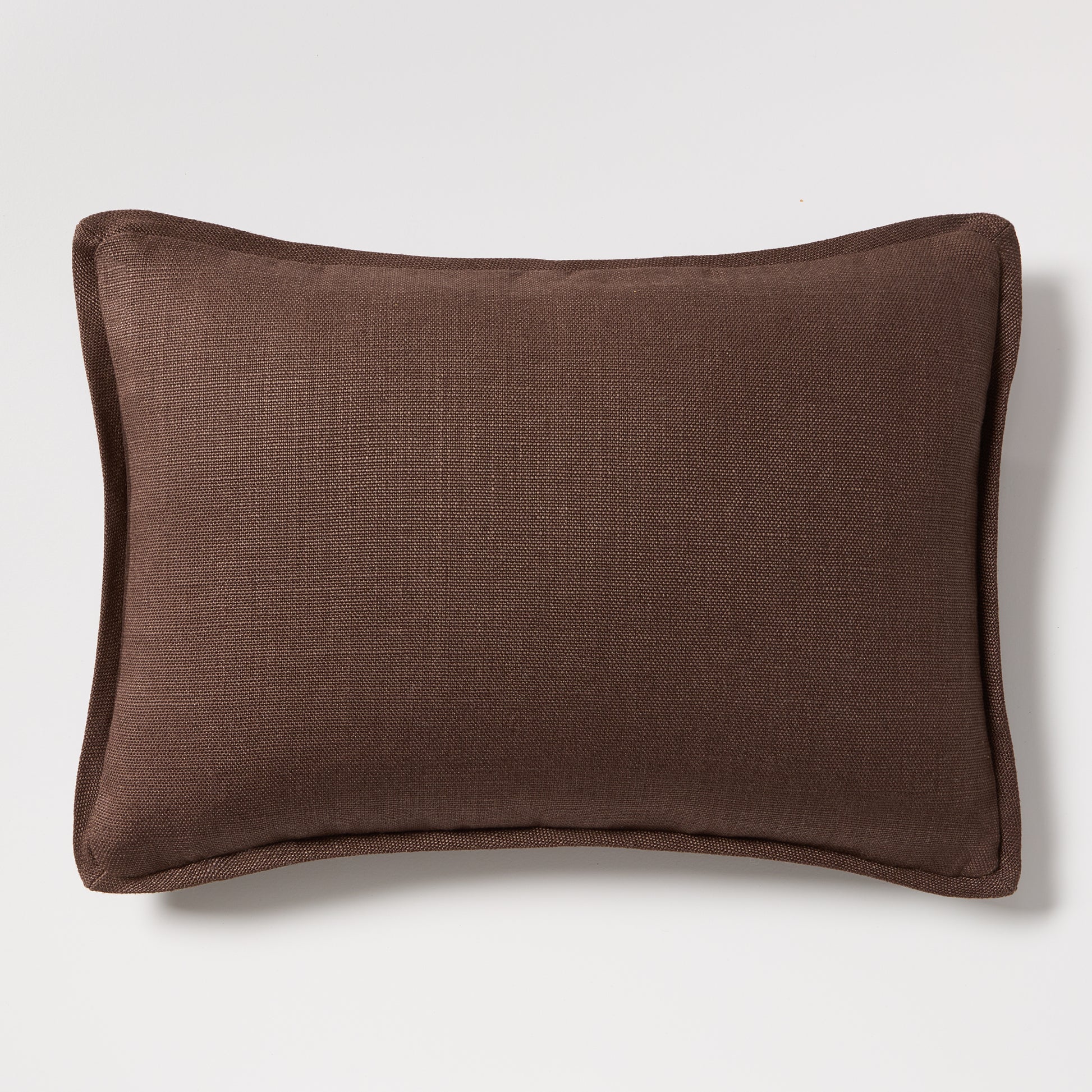Dark brown tonal reversible velvet and linen lumbar pillow, 20x14 inches.