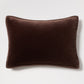 Dark brown velvet and linen reversible lumbar pillow, 20"L x 14"H, with tonal piping.