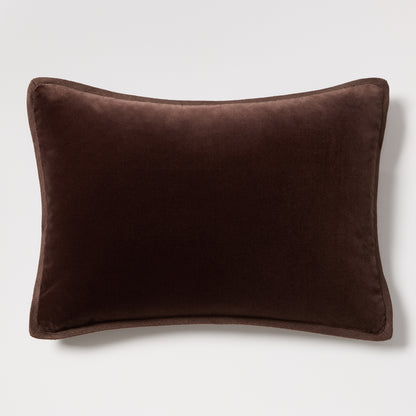 Dark brown velvet and linen reversible lumbar pillow, 20"L x 14"H, with tonal piping.