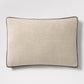Dark brown velvet gusseted and linen lumbar pillow, 20"L x 14"H, with dark brown piping.