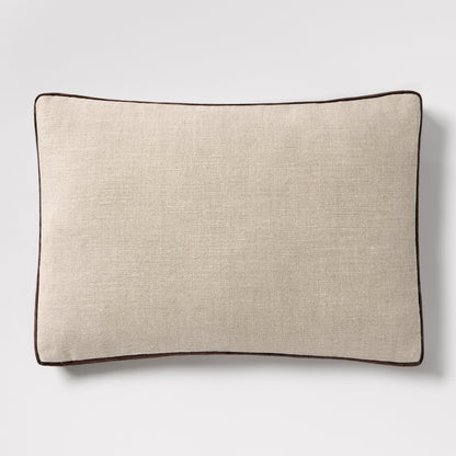 Dark brown velvet gusseted and linen lumbar pillow, 20"L x 14"H, with dark brown piping.