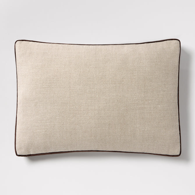 Dark brown velvet gusseted and linen lumbar pillow, 20"L x 14"H, with dark brown piping.