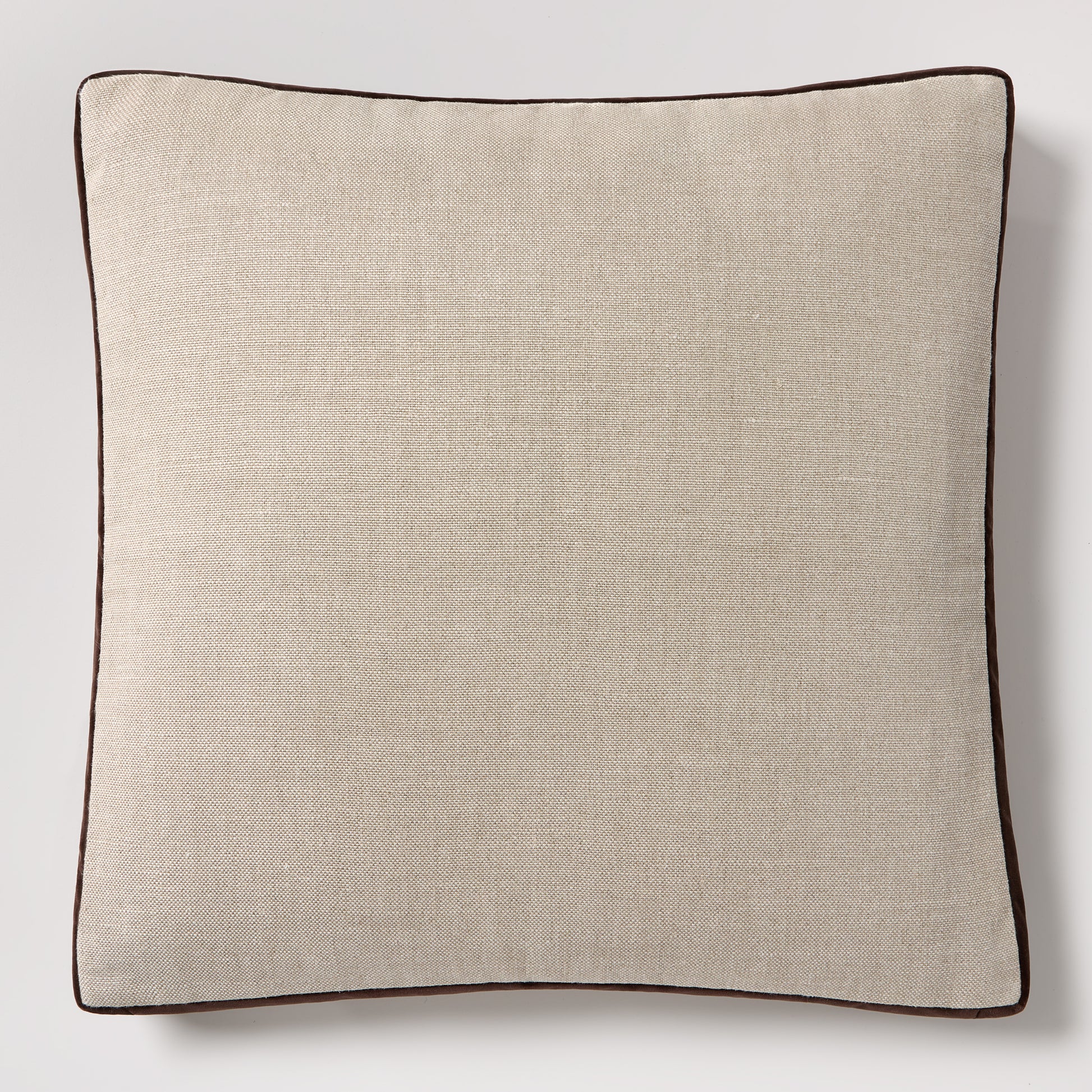 Square 22" flax linen pillow with dark brown velvet gusset and piping.