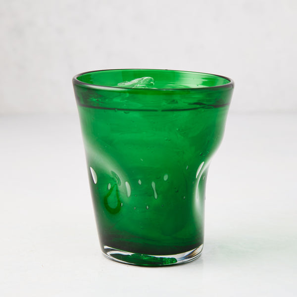 Dark green Henri mouth-blown glass, 8 oz., with unique imperfections and small air bubbles.