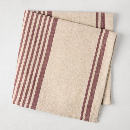Dark Plum Boat Stripe Natural Napkin, beige cotton-linen with deep purple stripes, folded.
