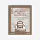 Hardcover book "Decorate Like a Decorator" with a brown spine and a cover featuring a striped chair against a scenic wallpaper.