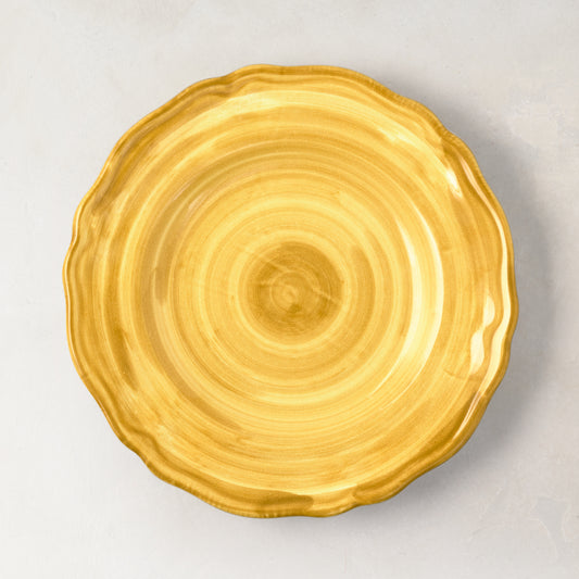 Deruta Yellow Painted Ceramic Salad Plate, 8.3"Dia, with hand-painted swirl design and wavy rim.