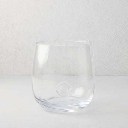 Clear mouth-blown glass Diana Small Scissor-Cut Vase with rounded base and subtle logo.