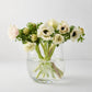 Clear, mouth-blown glass Diana Small Scissor-Cut Vase with white anemones.