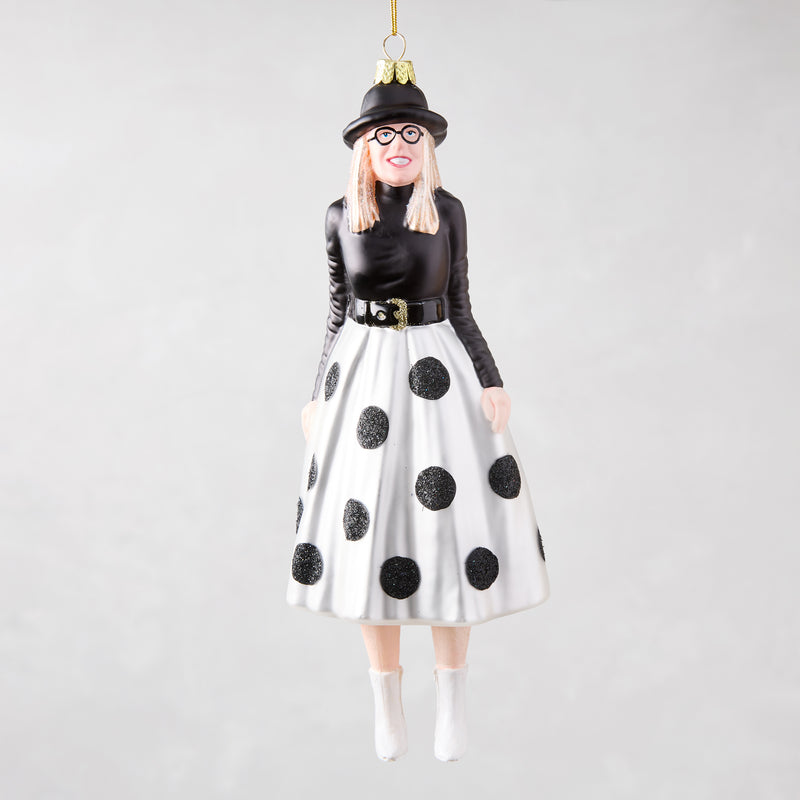 Diane Keaton Christmas tree ornament, black hat, glasses, black top, white polka dot skirt, white boots.