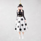 Diane Keaton Christmas tree ornament, black hat, glasses, black top, white polka dot skirt, white boots.
