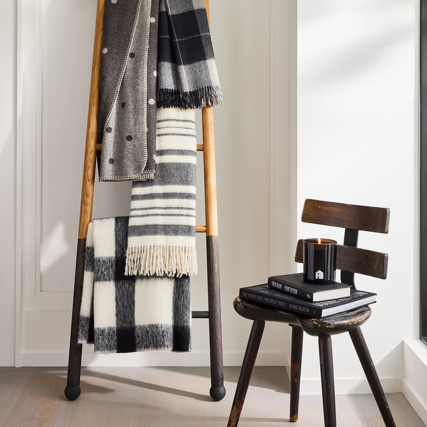 Diane Keaton + Hudson Grace black and white striped baby alpaca throw blanket with fringe.