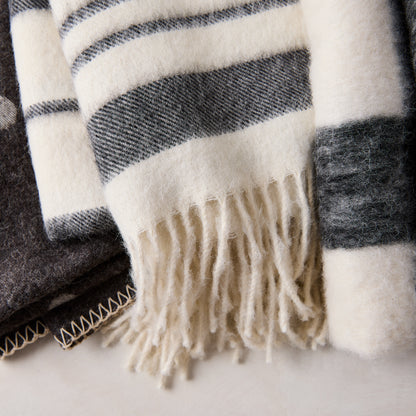 Diane Keaton x Hudson Grace black and white striped baby alpaca throw blanket with fringe.