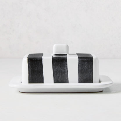 Diane Keaton + Hudson Grace white stoneware butter dish with hand-painted black stripes and lid handle.
