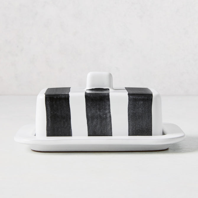Diane Keaton + Hudson Grace white stoneware butter dish with hand-painted black stripes and lid handle.
