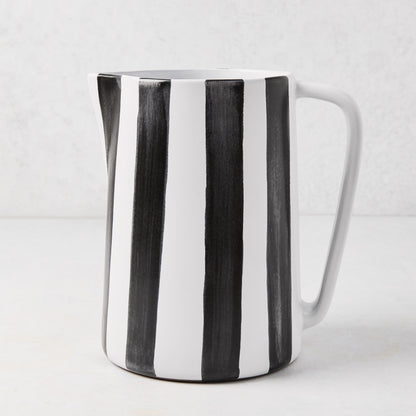 Diane Keaton + Hudson Grace black and white striped ceramic pitcher with geometric handle.