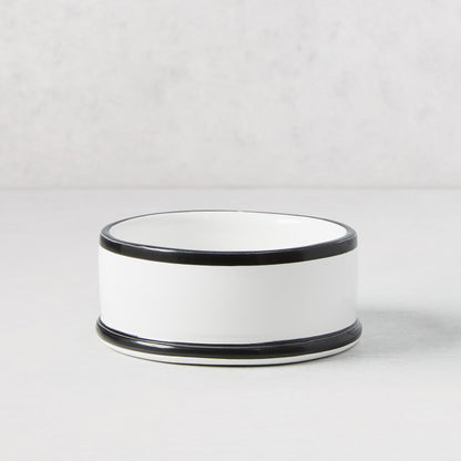 Diane Keaton + Hudson Grace white ceramic wine coaster with hand-painted black lines.