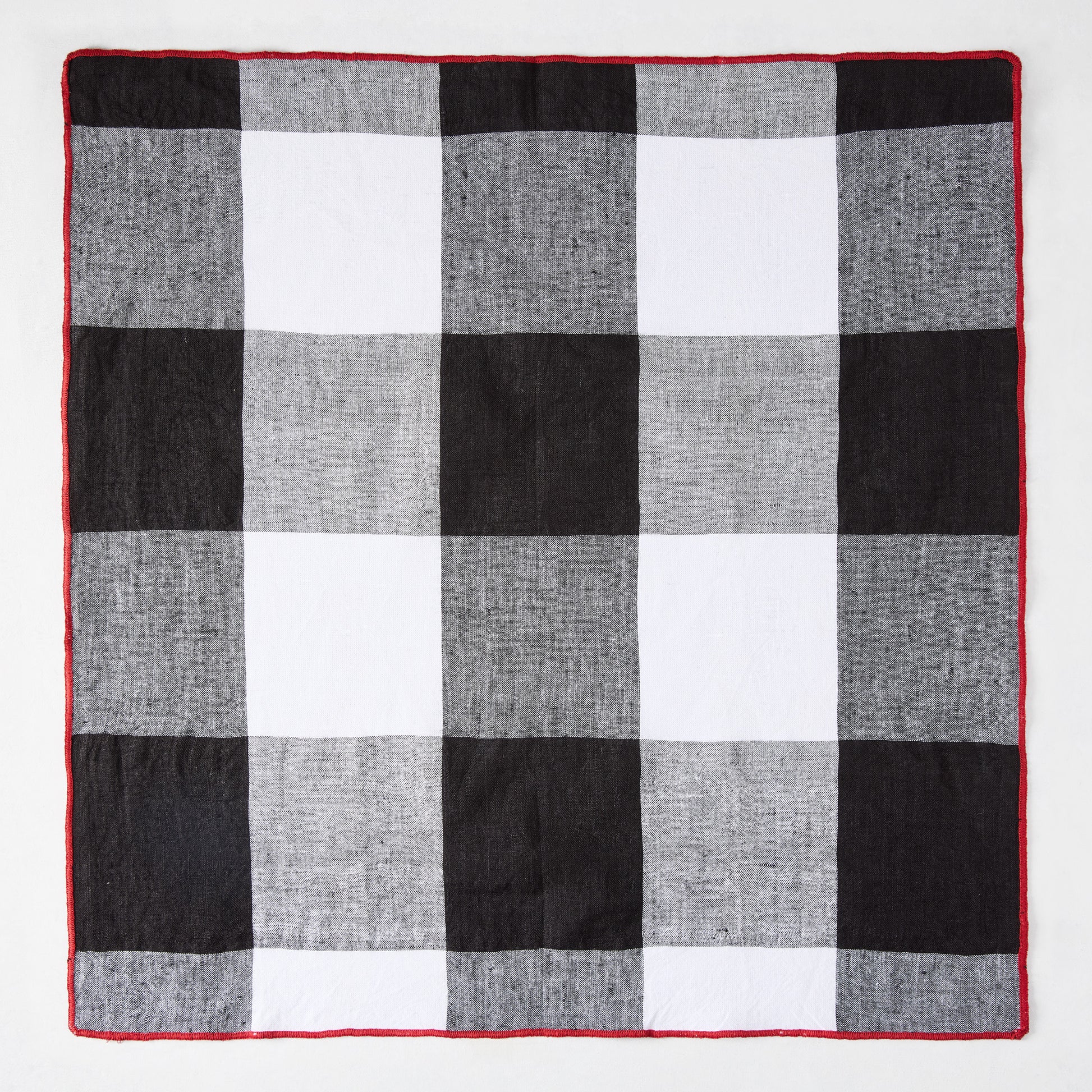 Diane Keaton + Hudson Grace black buffalo check napkin with red border, cotton linen blend.