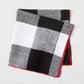 Diane Keaton + Hudson Grace black buffalo check cotton linen napkin with red border.