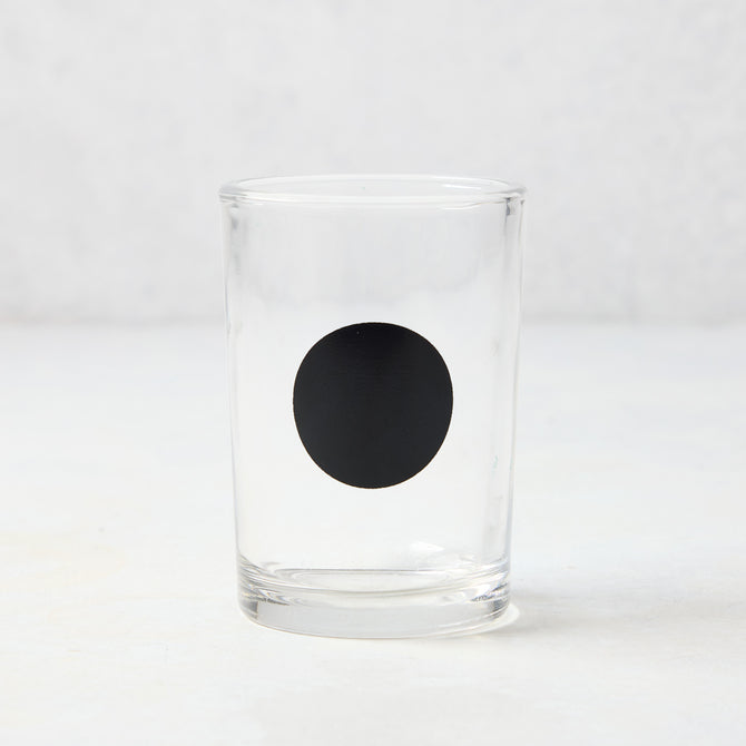 Diane Keaton + Hudson Grace clear glass everyday wine glass with a bold black dot.
