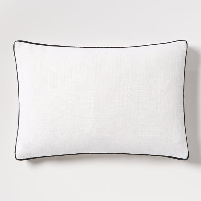 Diane Keaton + Hudson Grace white linen lumbar pillow with black gusseted trim.