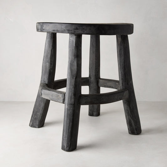 Diane Keaton + Hudson Grace black reclaimed teak wood stool with rustic texture.