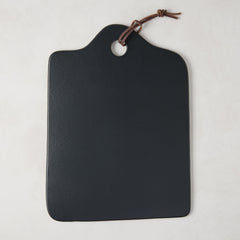 Diane Keaton + Hudson Grace black stone cheese board with leather handle.