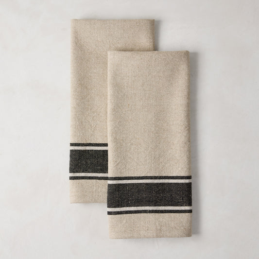Set of 2 Diane Keaton + Hudson Grace black striped khaki cotton-linen blend hand towels.