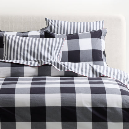 Diane Keaton + Hudson Grace black and white buffalo check percale duvet and shams with red piping.