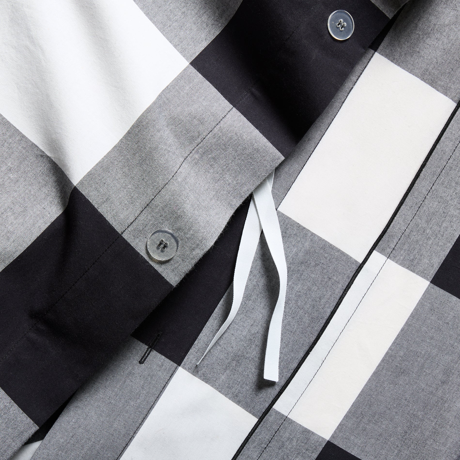 Diane Keaton + Hudson Grace black and white buffalo check percale duvet cover with button closure.