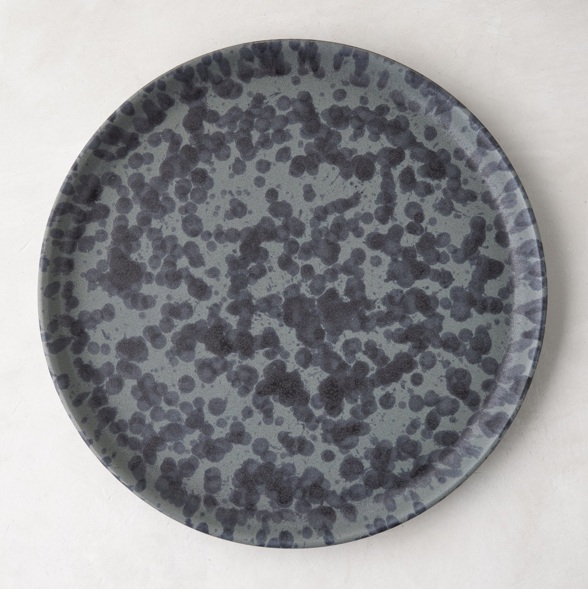 Diane Keaton + Hudson Grace Composition Splatter Stoneware Dinner Plate, black and grey pattern.
