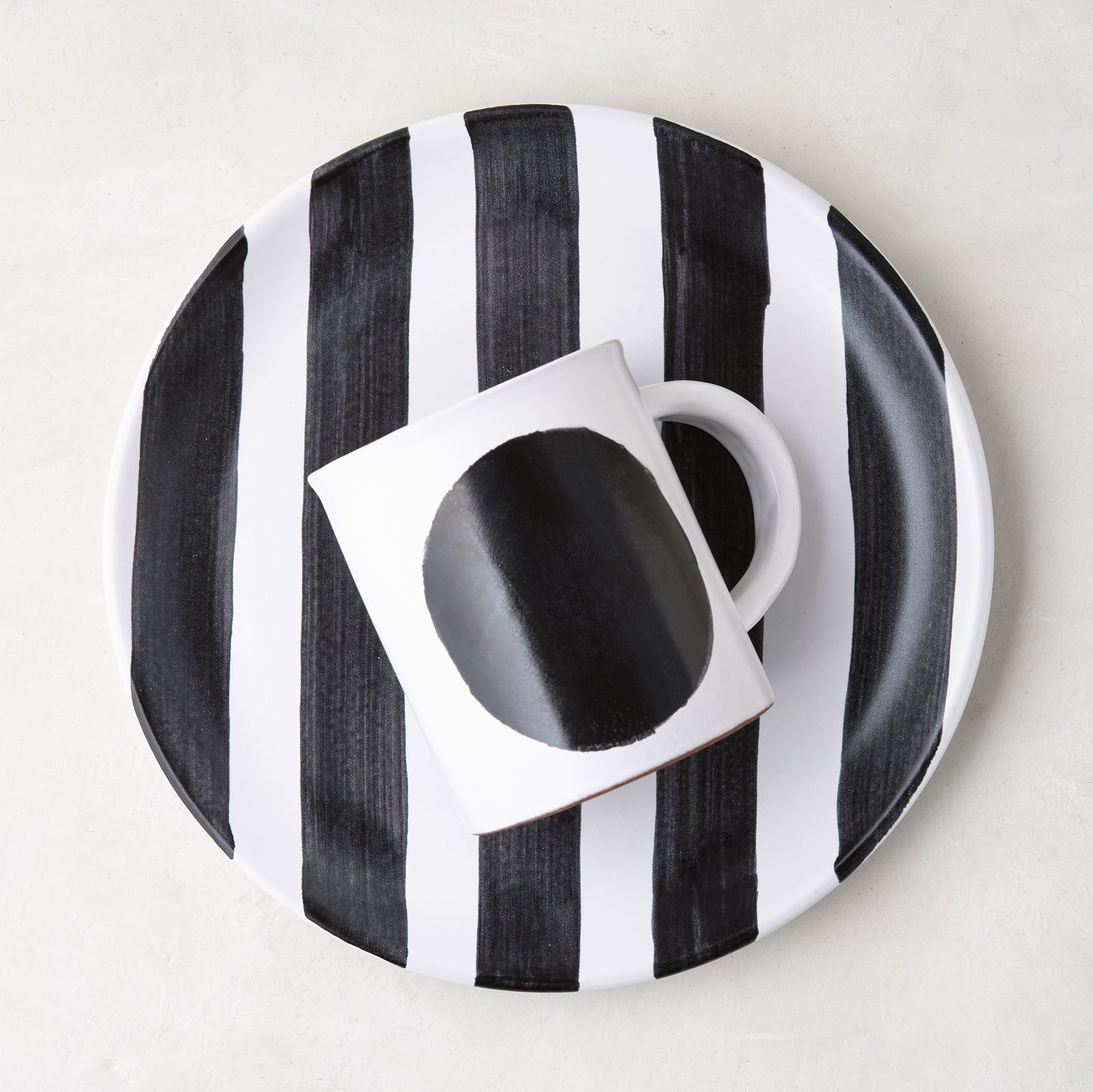 Diane Keaton + Hudson Grace Domino Striped Stoneware Salad Plate with black and white stripes.