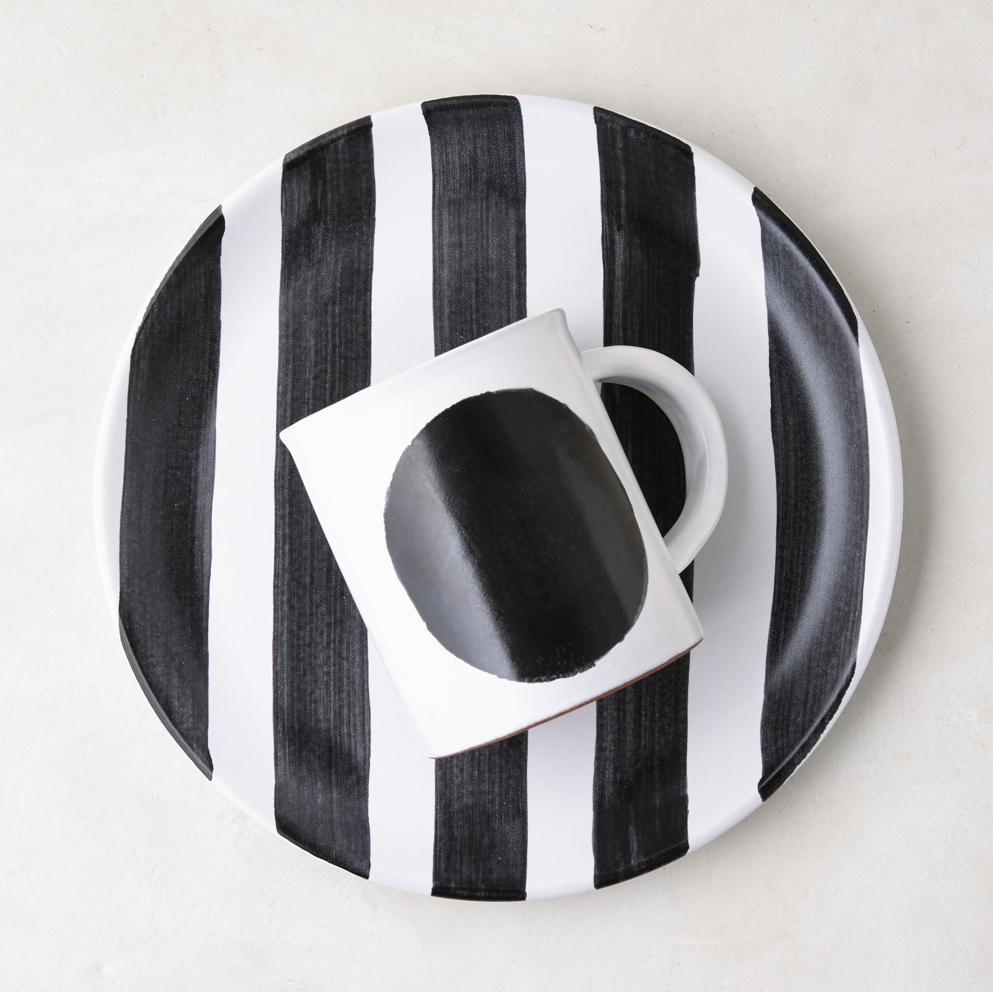 Diane Keaton + Hudson Grace Domino Striped Stoneware Salad Plate with black and white stripes.