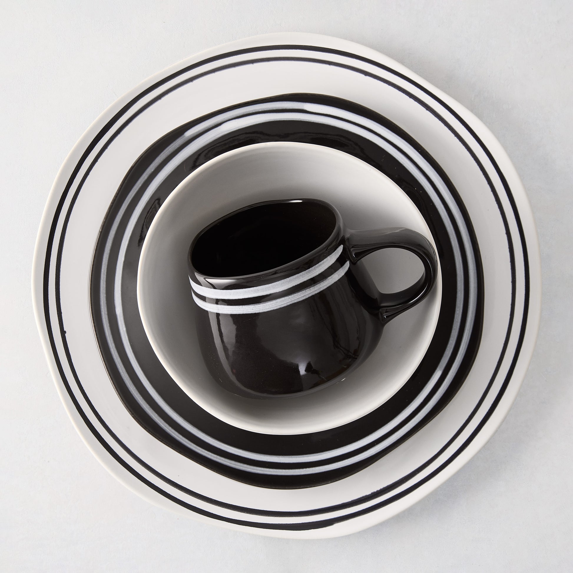 Diane Keaton + Hudson Grace Draft Collection black and white stoneware dinnerware set with double stripes.