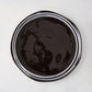 Diane Keaton + Hudson Grace Draft black stoneware salad plate with white double stripe.