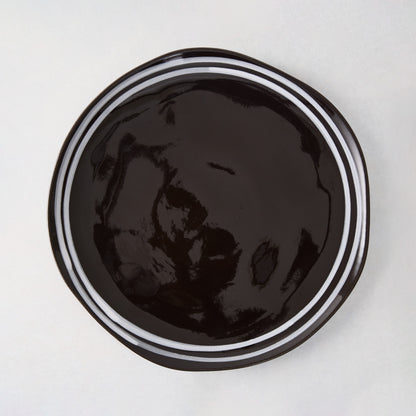 Diane Keaton + Hudson Grace Draft black stoneware salad plate with white double stripe.