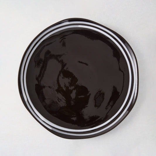 Diane Keaton + Hudson Grace Draft black stoneware salad plate with white double stripe.