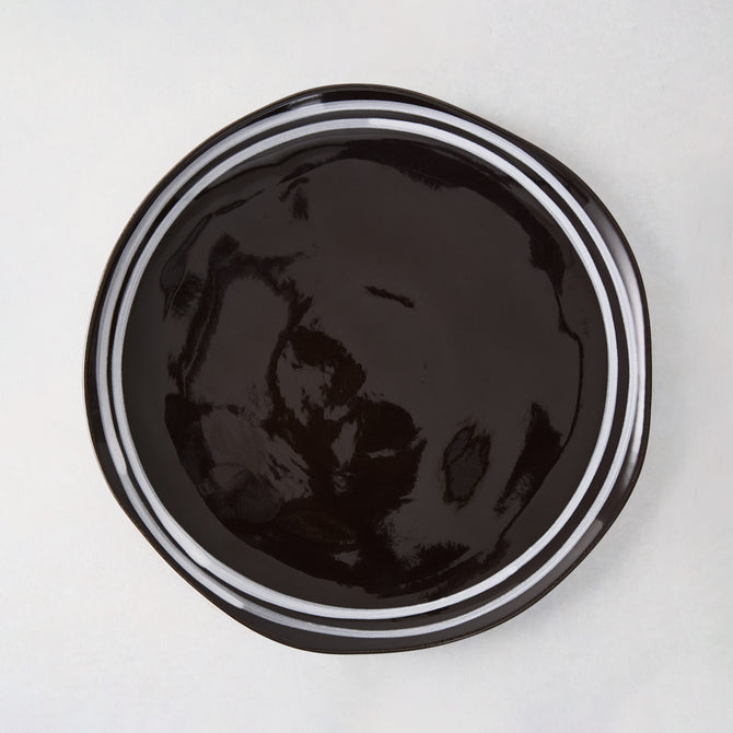 Diane Keaton + Hudson Grace Draft black stoneware salad plate with white double stripe.