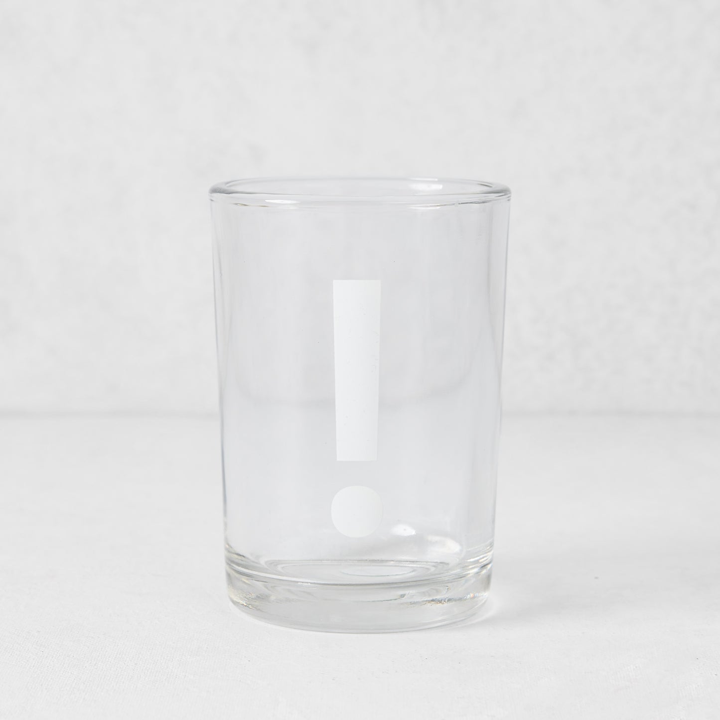 Clear glass Everyday Wine Glass with a white exclamation point design.