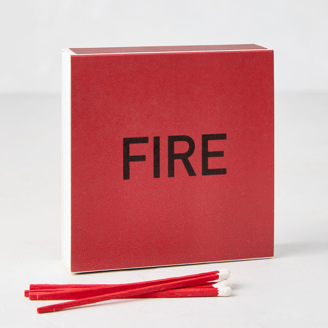 Diane Keaton x Hudson Grace "Fire" oversized red boxed matches with black text and several red matches.