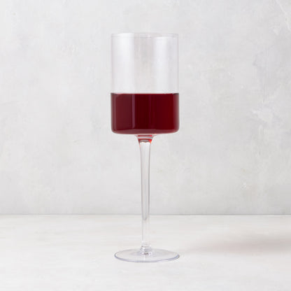 Diane Keaton + Hudson Grace High Rise Large Wine Glass, clear lead-free glass with red wine, modern straight-sided design.