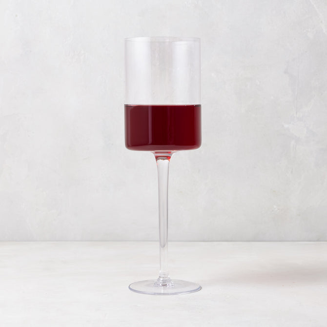Diane Keaton + Hudson Grace High Rise Large Wine Glass, clear lead-free glass with red wine, modern straight-sided design.