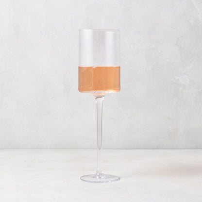 Diane Keaton + Hudson Grace High Rise Small Wine Glass, clear lead-free glass with rose wine.