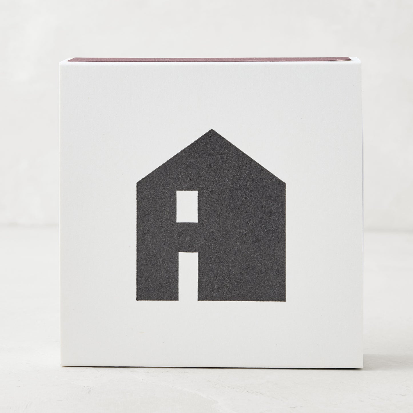 Diane Keaton + Hudson Grace "House Icon" oversized boxed matches, white box with black house graphic.
