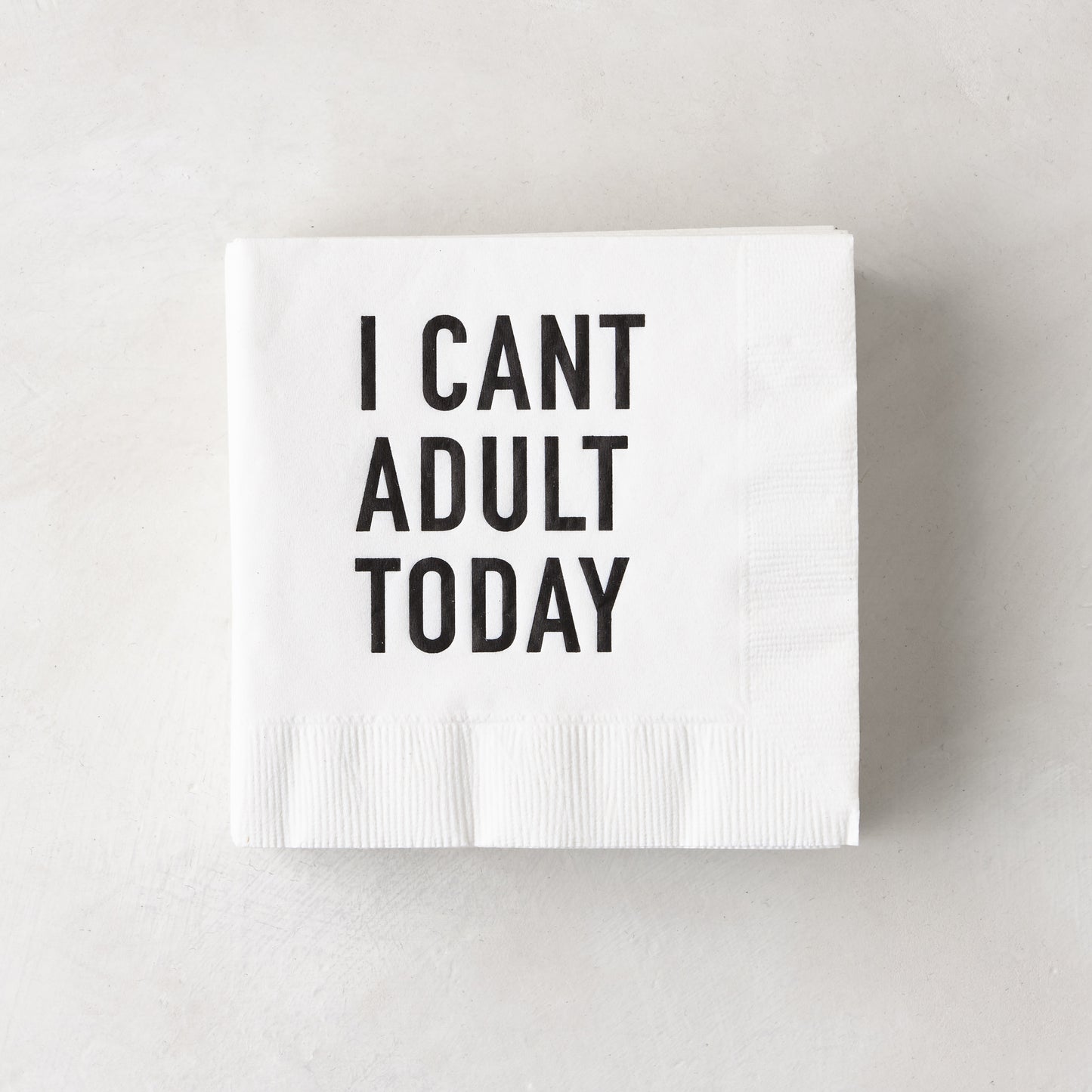 White 5.5" square paper cocktail napkin with "I CAN'T ADULT TODAY" in black text.