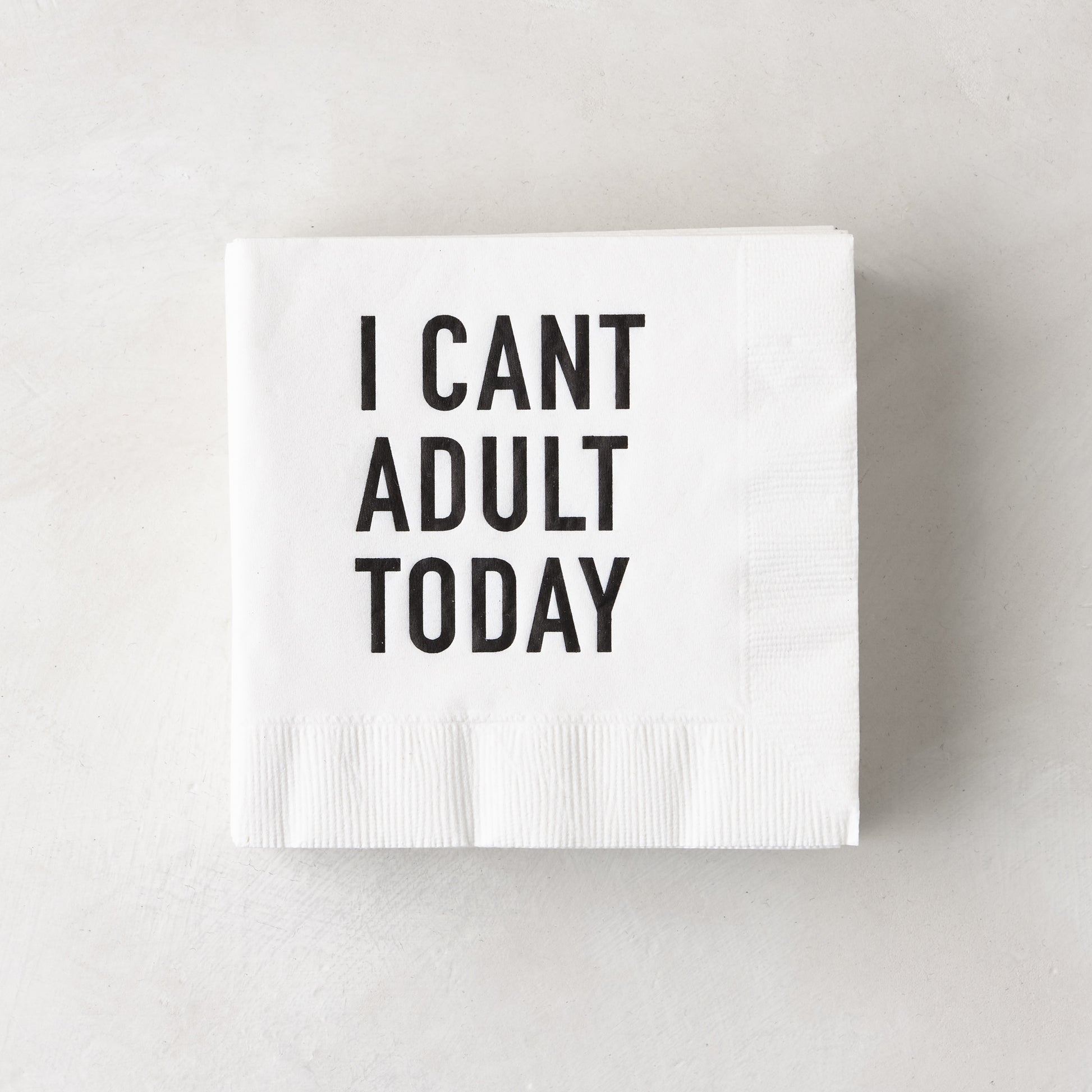 White 5.5" square paper cocktail napkin with "I CAN'T ADULT TODAY" in black text.