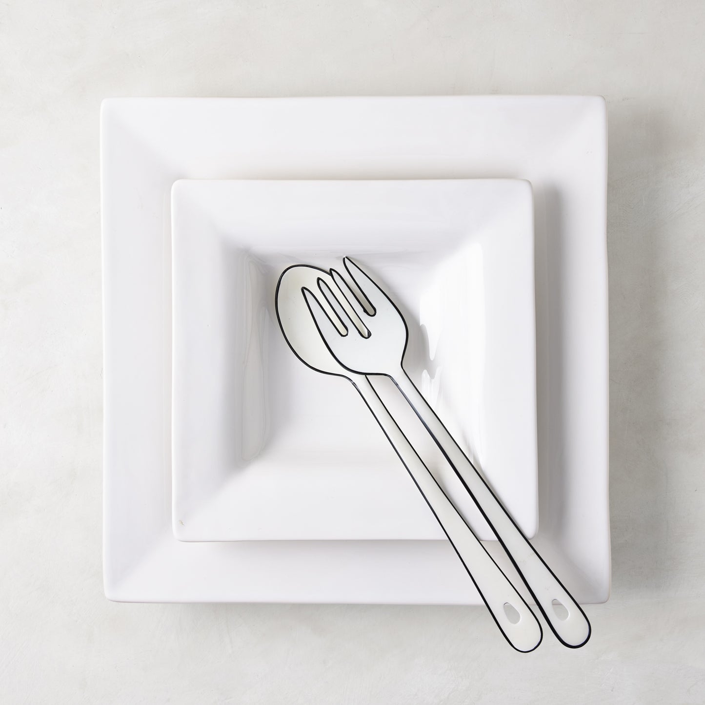Diane Keaton + Hudson Grace "Keaton" small white ceramic square serving platter with serving utensils.