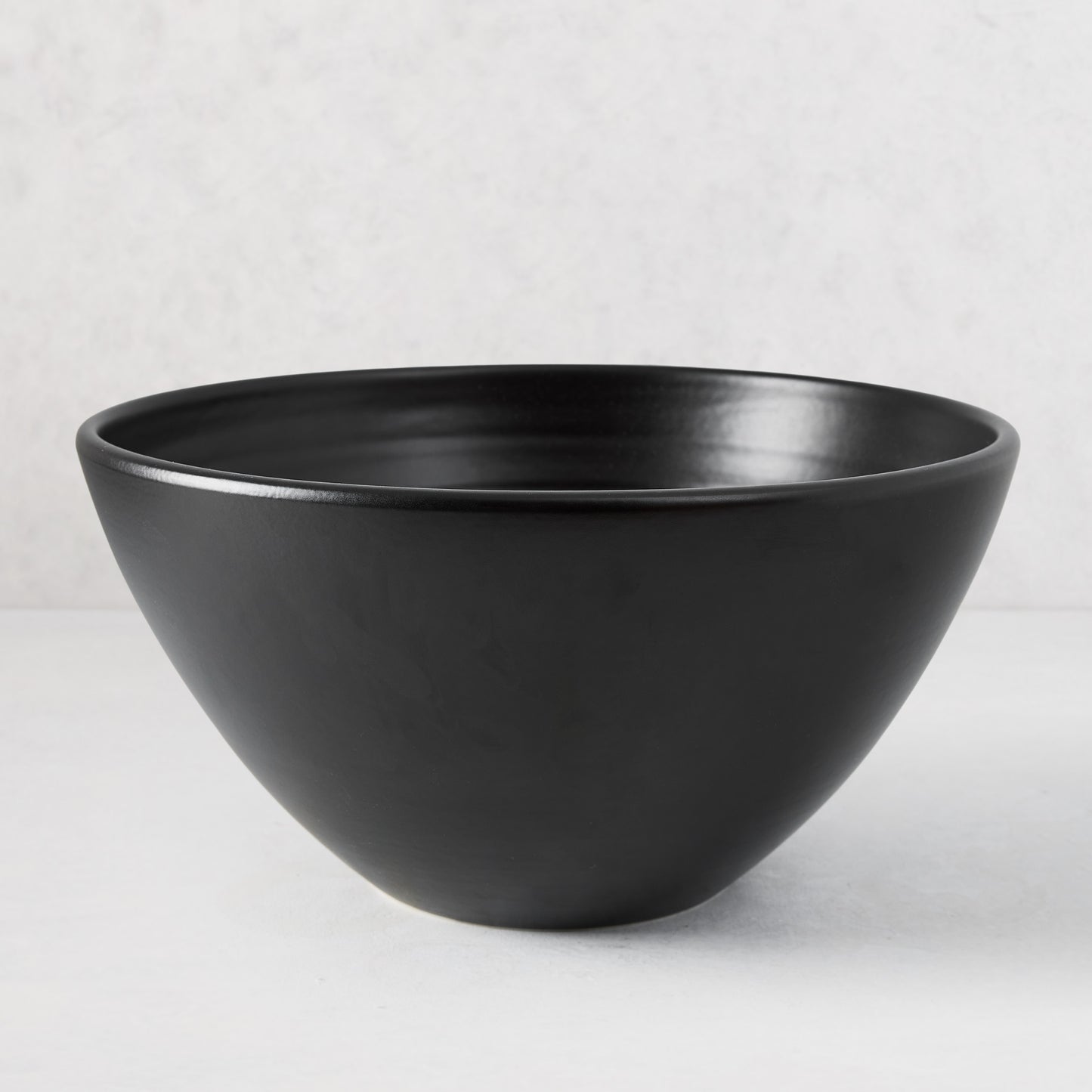 Diane Keaton + Hudson Grace large matte black modern ceramic serve bowl.